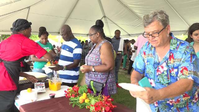 Patrons partaking in the Nevisian Chef Mango Fest at Oualie Beach on July 09, 2017